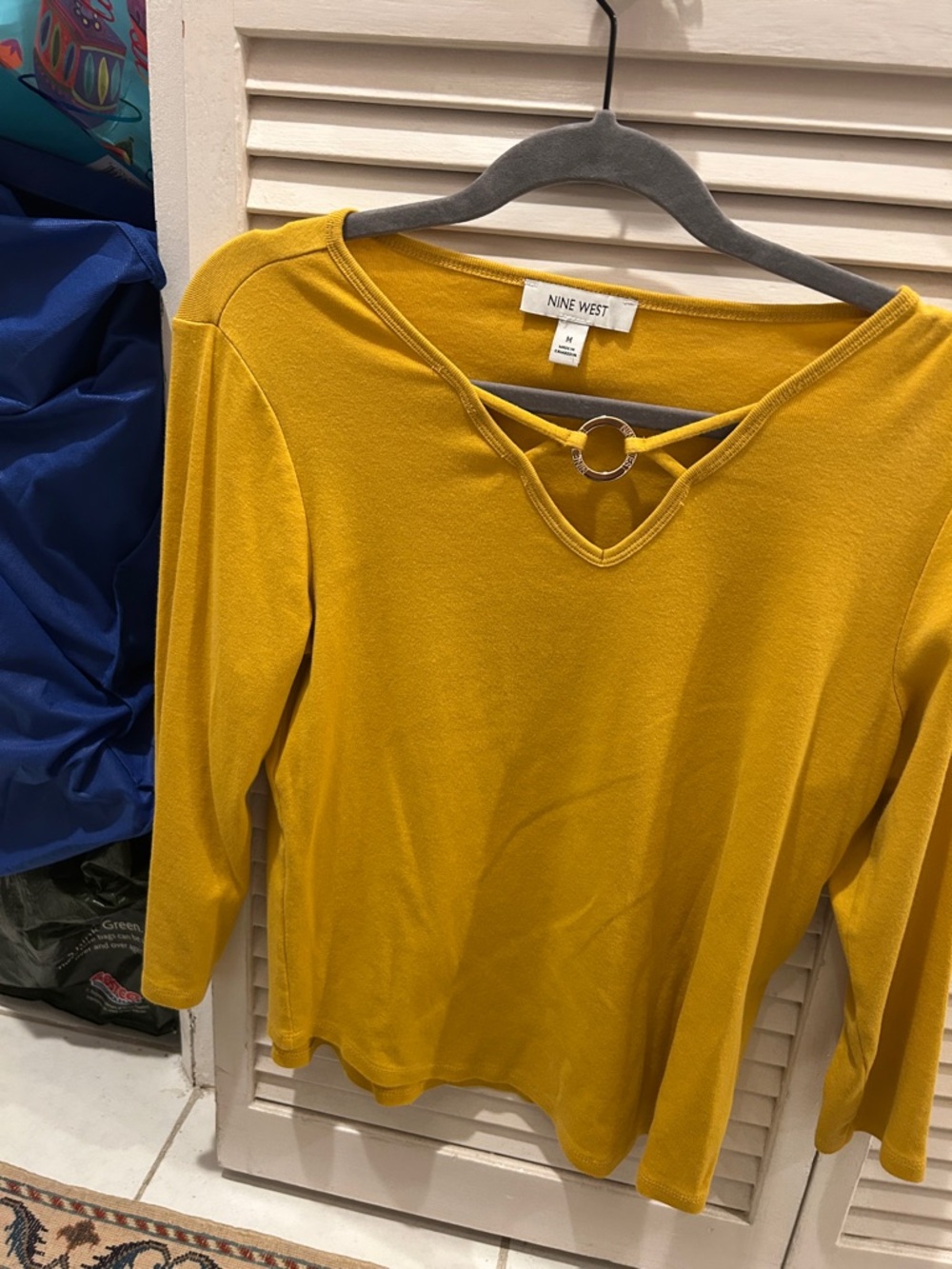 Nine West Mustard variant color V-Neck Top with Ring Detail. Size medium.
